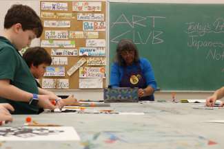 teaching artist with students