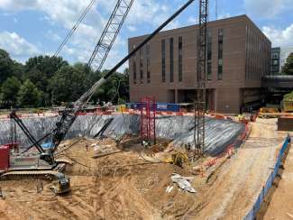 image show the City Hall construction site with Tower crane base 