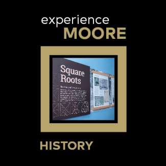 an image of the visitor center display of the history of Moore square