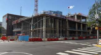Construction image of City Hall from corner of Hargett and McDowell streets