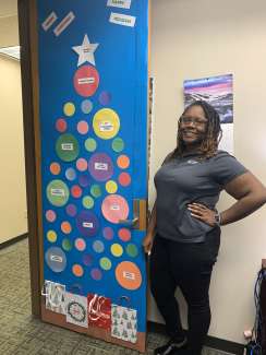 Cydney Terry Raleigh Water employee picture during holiday door decoration contest