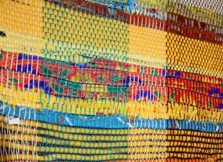 Photo of a colorful weaved fabric
