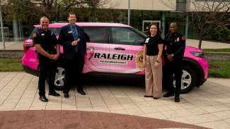 RPD Chief Boyce and others stand by pink police cruiser