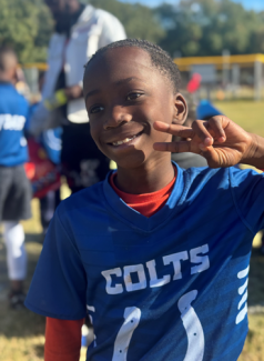 a boy winning an award