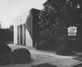 Historic black and white photograph of the original entrance of a 1939 theater building. 