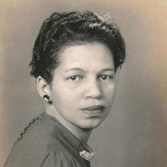 a vintage headshot of Evelyn Pope