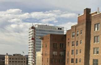 View of City Skyline from Fayetteville Street, eighth floor of One Exchange Plaza. 