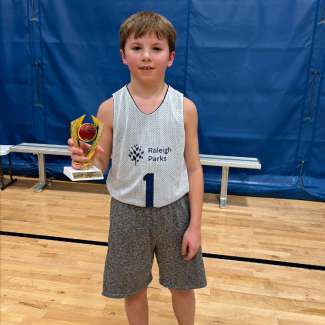 Graydon with basketball trophy