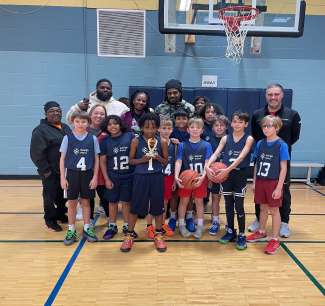 Julian P with team and trophy